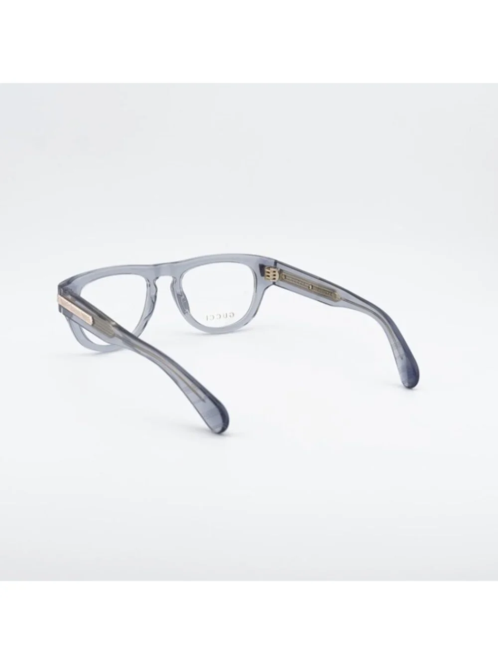 Gucci GG1519O 003 Eyeglasses Shiny Transparent Grey 51mm Oval Frame